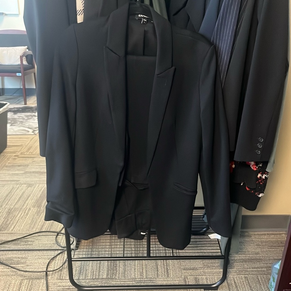 Full suit. Cotton comfortable material yet with structured professional look.